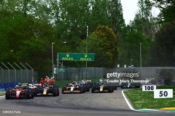 Charles Leclerc of Monaco driving the Ferrari F1-75 leads the field at the start during Sprint ahead of the F1 Grand Prix of Emilia Romagna at...