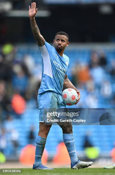 Gabriel Jesus of Manchester City waves to the fans with the match ball after scoring four goals during the Premier League match between Manchester...