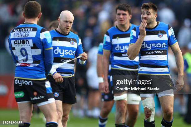 Will Muir of Bath looks dejected after his sides defeat alongside Ben Spencer and Joe Simpson during the Gallagher Premiership Rugby match between...