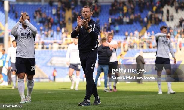 Gary Rowett, manager of Millwall applauds the travelling supporters during the Sky Bet Championship match between Birmingham City and Millwall at St...