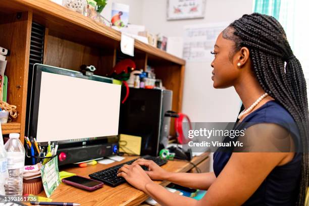 teacher using desktop - administrative professionals day stockfoto's en -beelden