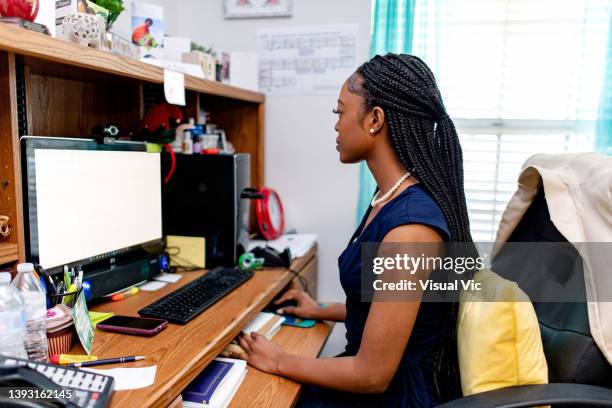 aboriginal teacher using computer - administrative professional day stock pictures, royalty-free photos & images