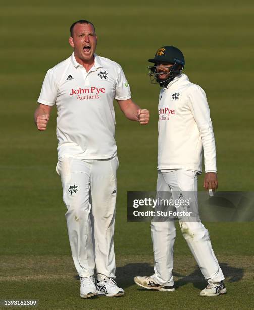 Notts bowler Luke Fletcher celebrates with Haseeb Hameed after taking the wicket of Ben Raine during day three of the LV= Insurance County...