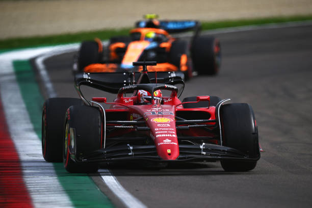 F1 Grand Prix of Emilia Romagna - SprintIMOLA, ITALY - APRIL 23: Charles Leclerc of Monaco driving (16) the Ferrari F1-75 leads Lando Norris of Great Britain driving the (4) McLaren MCL36 Mercedes during Sprint ahead of the F1 Grand Prix of Emilia Romagna at Autodromo Enzo e Dino Ferrari on April 23, 2022 in Imola, Italy.