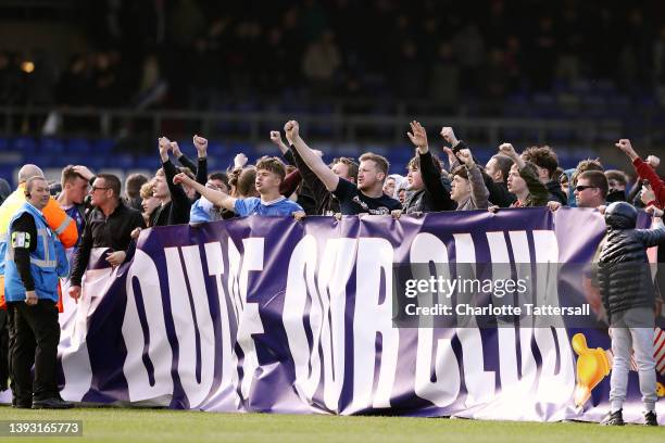 Oldham Athletic fans protest on the pitch while holding a banner which reads 'Get Out Of Our Club' leading to the match to be abandoned during the...
