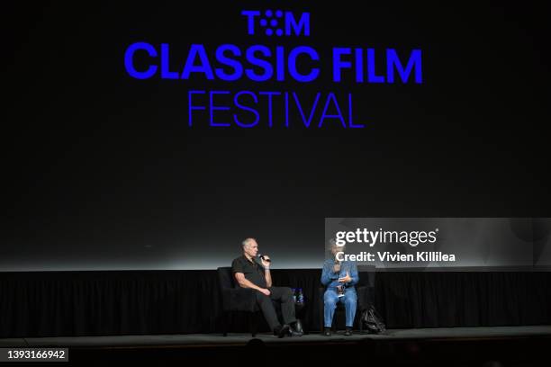 Special guests John Sayles and Maggie Renzi speak onstage at the screening of "Return of the Secaucus Seven" during the 2022 TCM Classic Film...