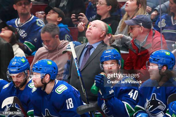 Head coach Bruce Boudreau of the Vancouver Canucks looks on from the bench during their NHL game against the Dallas Stars at Rogers Arena April 18,...