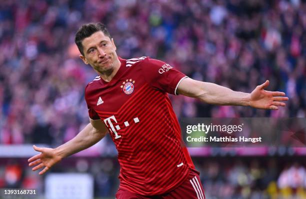 Robert Lewandowski of FC Bayern Muenchen celebrates after scoring their team's second goal during the Bundesliga match between FC Bayern Muenchen and...