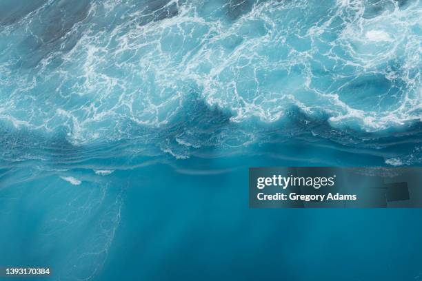 waves in the caribbean sea - sea foam stock pictures, royalty-free photos & images