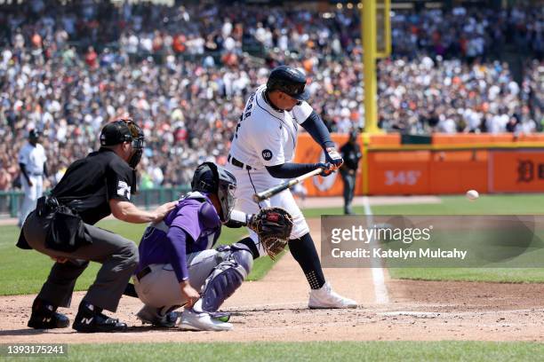 Miguel Cabrera of the Detroit Tigers hits a single, the 3000th hit of his career, during the first inning in Game One of a doubleheader against the...