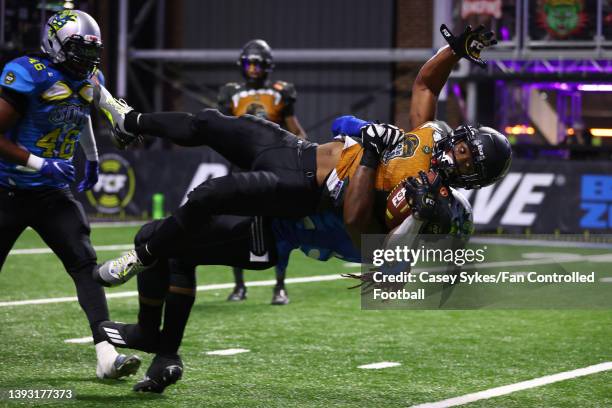 Jim Jones of 8oki tackles Jakobie Baker of Bored Apes FC during the first half during Fan Controlled Football Season v2.0 - Week Two on April 23,...