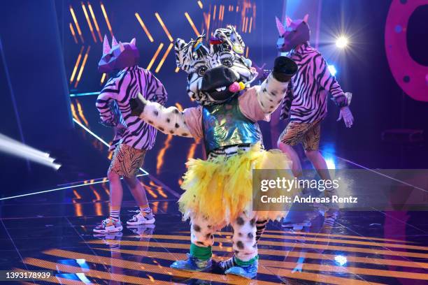 Das Zebra" performs during the finals of the 6th season of "The Masked Singer" at MMC Studios on April 23, 2022 in Cologne, Germany.