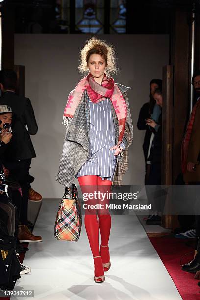 Model walks the runway at the Vivienne Westwood Autumn/Winter 2012 show at London Fashion Week at Goldsmiths' Hall on February 19, 2012 in London,...