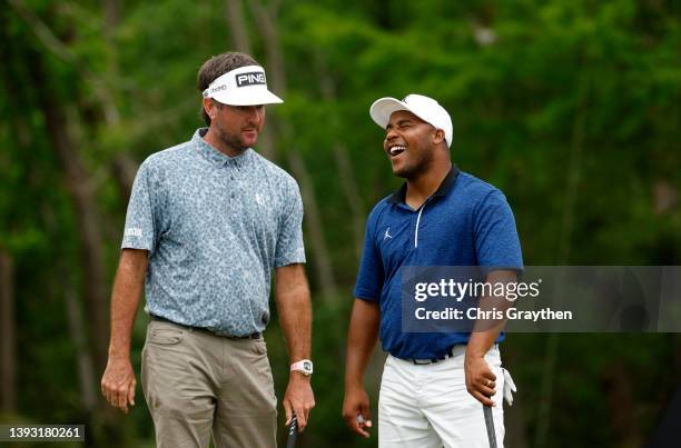 Bubba Watson and Harold Varner III share a laugh on the 10th hole during the third round of the Zurich Classic of New Orleans at TPC Louisiana on...