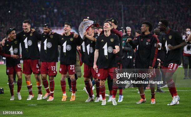 Bayern Muenchen players celebrate with the fans after their sides victory won them the Bundesliga title during the Bundesliga match between FC Bayern...