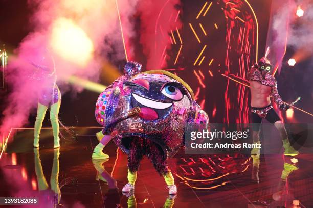 Die Diskokugel" performs during the finals of the 6th season of "The Masked Singer" at MMC Studios on April 23, 2022 in Cologne, Germany.