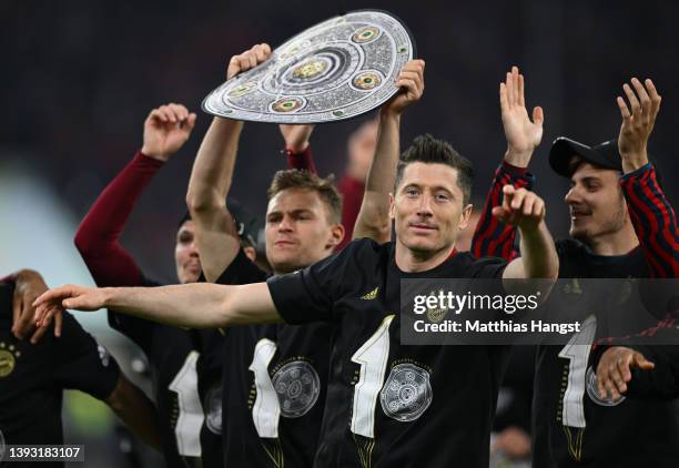 Robert Lewandowski of FC Bayern Muenchen celebrates after their sides victory during the Bundesliga match between FC Bayern Muenchen and Borussia...