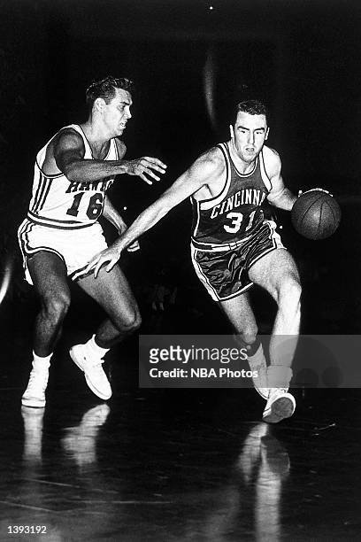 Jack Twyman of the Cincinnati Royals drives to the basket against the St. Louis Hawks during an NBA game in 1958 in St. Louis, Missouri. NOTE TO...