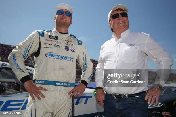 Austin Hill, driver of the Bennett Transportation and Logistics Chevrolet, and team owner Richard Childress talk on the grid prior to the NASCAR...