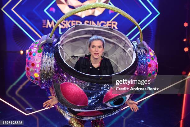 Jeanette Biedermann poses after being revealed to be "Die Diskokugel" during the finals of the 6th season of "The Masked Singer" at MMC Studios on...