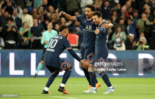 Lionel Messi of Paris Saint-Germain celebrates after scoring the first goal of his team with teammates Marquinhos and Neymar Jr during the Ligue 1...