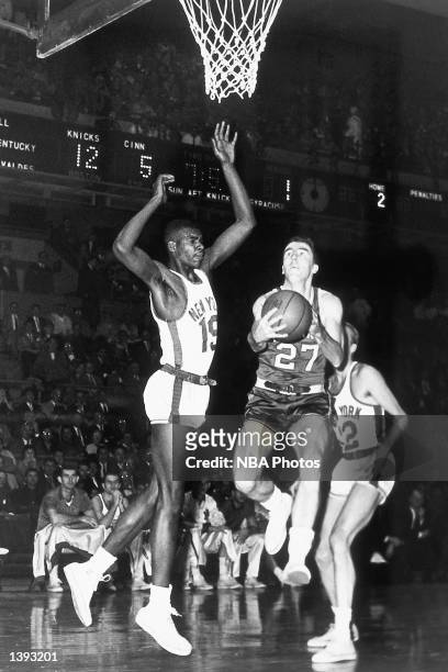 Jack Twyman of the Cincinnati Royals drives to the basket against the New York Knicks during an NBA game at Madison Square Garden in 1958 in New...