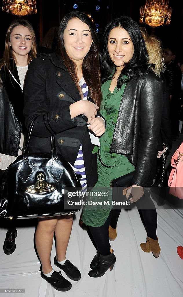 Cora Rees Cora Corre and Serena Rees sit in the front row at the Vivienne... News ...