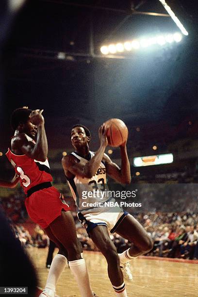 David Thompson of the Denver Nuggets drives to the basket during an NBA game in Denver, Colorado. NOTE TO USER: User expressly acknowledges and...