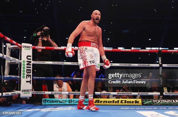 Tyson Fury reacts to victory after the WBC World Heavyweight Title Fight between Tyson Fury and Dillian Whyte at Wembley Stadium on April 23, 2022 in...