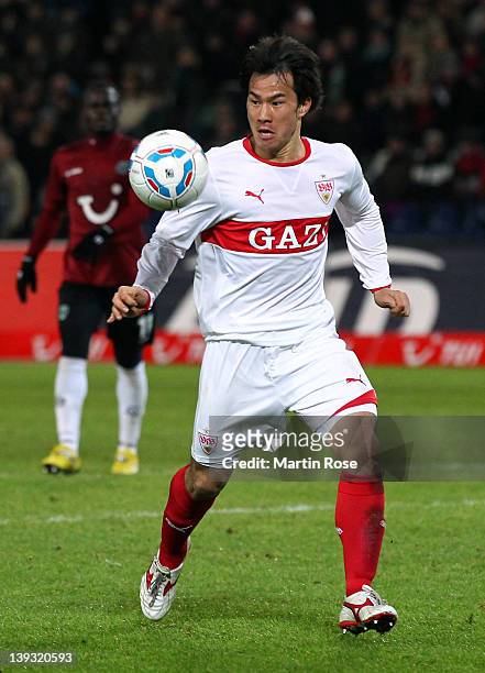 Shinji Okazaki of Stuttgart runs with the ball during the Bundesliga match between Hannover 96 and VfB Stuttgart at AWD Arena on February 19, 2011 in...