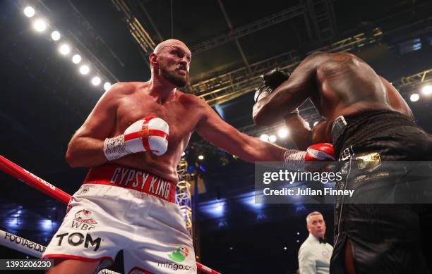 Tyson Fury punches Dillian Whyte during the WBC World Heavyweight Title Fight between Tyson Fury and Dillian Whyte at Wembley Stadium on April 23,...