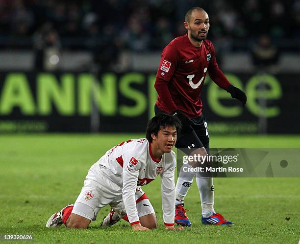 Sofian Chahed of Hannover and Shinji Okazaki of Stuttgart battle for the ball during the Bundesliga match between Hannover 96 and VfB Stuttgart at...