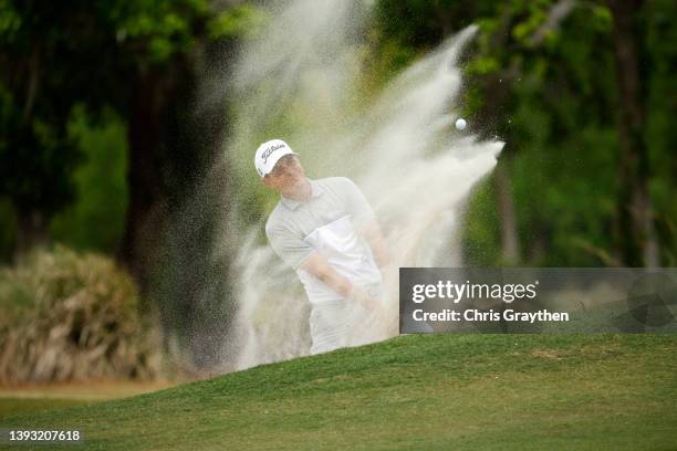 Jason Scrivener of Australia plays his shot out of the bunker during the third round of the Zurich Classic of New Orleans at TPC Louisiana on April...