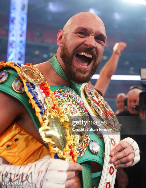 Tyson Fury celebrates victory after the WBC World Heavyweight Title Fight between Tyson Fury and Dillian Whyte at Wembley Stadium on April 23, 2022...