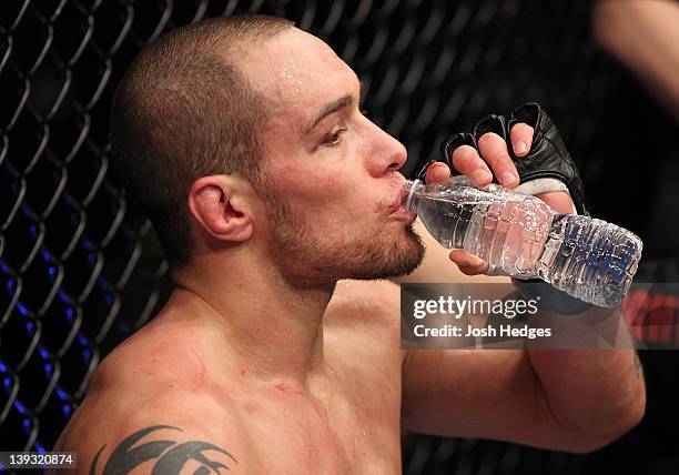 Justin Salas sits in his corner between rounds during his bout against Anton Kuivanen during the UFC on FUEL TV event at Omaha Civic Auditorium on...