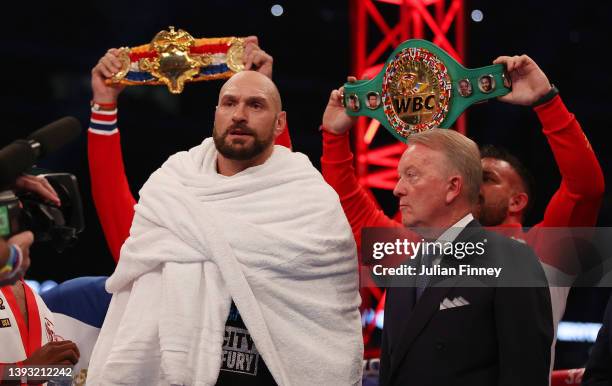 Tyson Fury and Promoter Frank Warren look on from inside the ring prior to the WBC World Heavyweight Title Fight between Tyson Fury and Dillian Whyte...