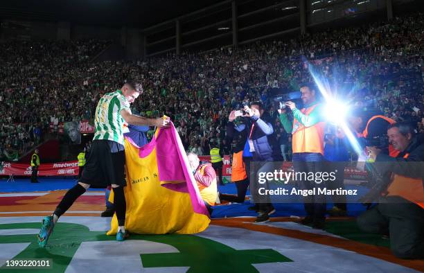 Joaquin of Real Betis pretends to be a matador as they celebrate victory after the Copa del Rey final match between Real Betis and Valencia CF at...