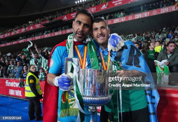 Claudio Bravo of Real Betis adn their team mate celebrate victory with the Copa del Rey trophy after the Copa del Rey final match between Real Betis...