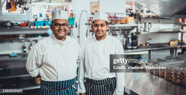 head chef and sous chef - chefs whites stock pictures, royalty-free photos & images