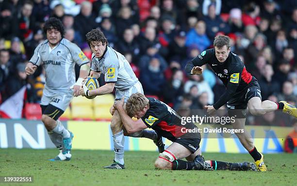 Anthony Allen of Leicester is tackled by Hugh Vyvyan during the Aviva Premiership match between Saracens and Leicester Tigers at Vicarage Road on...