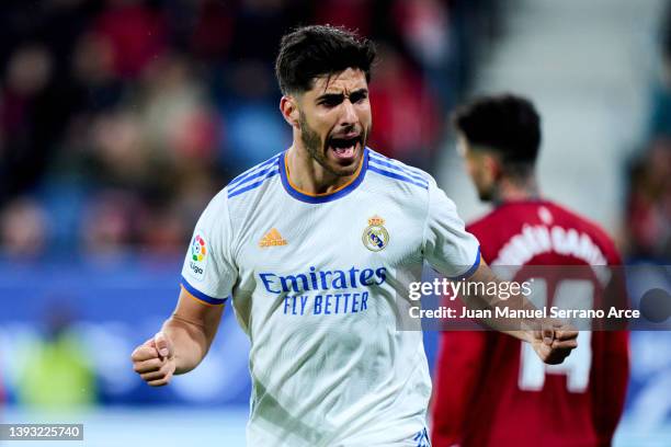 Marco Asensio of Real Madrid celebrates after scoring his team's second goal during the LaLiga Santander match between CA Osasuna and Real Madrid CF...