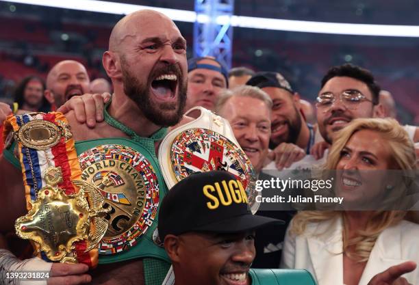Tyson Fury celebrates victory after the WBC World Heavyweight Title Fight between Tyson Fury and Dillian Whyte at Wembley Stadium on April 23, 2022...
