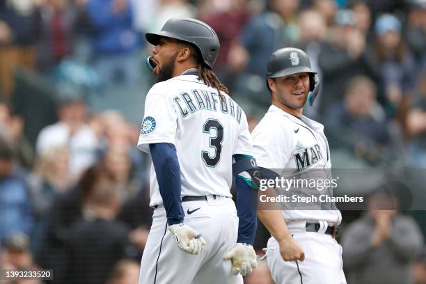 Crawford of the Seattle Mariners celebrates his two run home run with Ty France against the Kansas City Royals during the first inning at T-Mobile...