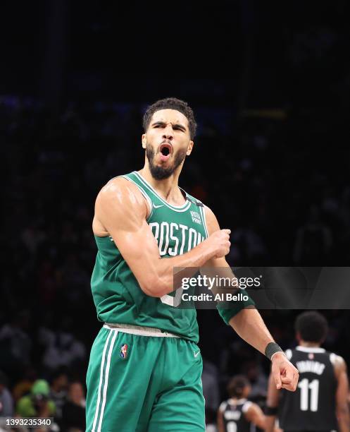 Jayson Tatum of the Boston Celtics celebrates a 109-103 win against the Brooklyn Nets during Game Three of the Eastern Conference First Round NBA...