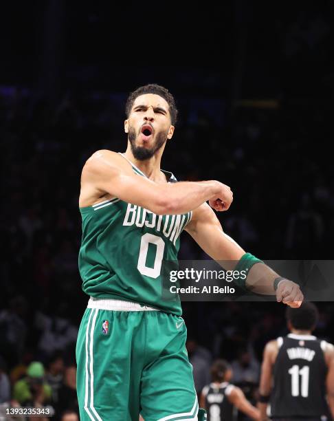 Jayson Tatum of the Boston Celtics celebrates a 109-103 win against the Brooklyn Nets during Game Three of the Eastern Conference First Round NBA...