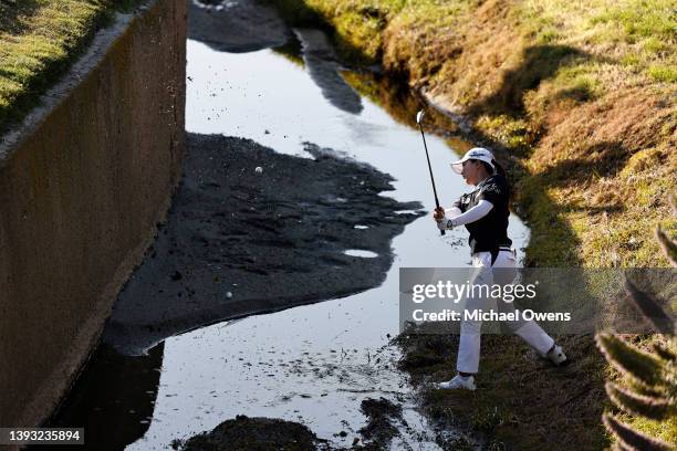 Jin Young Ko of South Korea hits from the out of bounds area on the 17th hole during the third round of the DIO Implant LA Open at Wilshire Country...