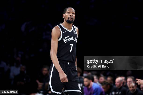 Kevin Durant of the Brooklyn Nets looks on against the Boston Celtics during Game Three of the Eastern Conference First Round NBA Playoffs at...