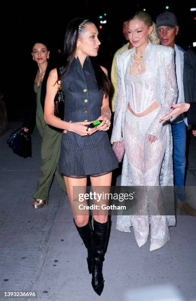 Bella Hadid and Gigi Hadid arrive at Gigi Hadid's 27th birthday party at Zero Bond on April 23, 2022 in New York City.