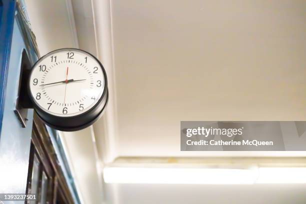 traditional school hallway clock - heritage hall stock pictures, royalty-free photos & images