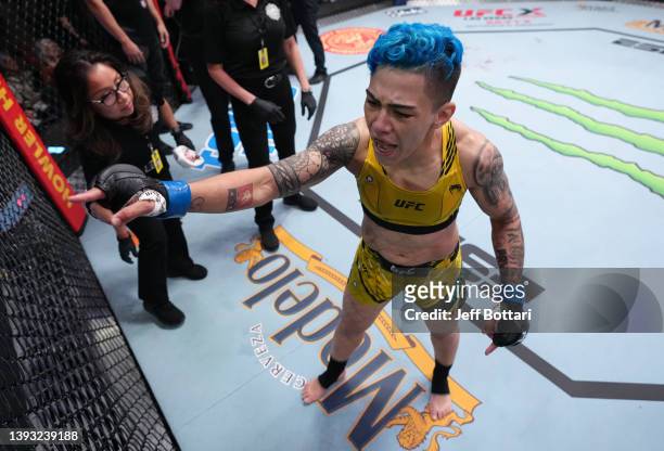Jessica Andrade of Brazil reacts after submitting Amanda Lemos of Brazil in a strawweight fight during the UFC Fight Night event at UFC APEX on April...